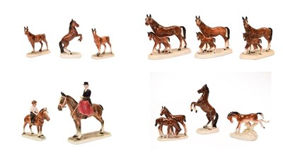 Lot 131 - A collection of Continental horse models including: a Katzhutte lady on horse riding side...