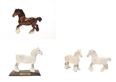 Lot 134 - Beswick Shire Horses Including: Cantering Shire, model No. 975, grey gloss and Shire Mare,...