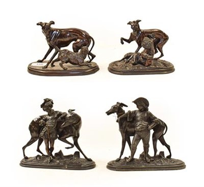 Lot 158 - Four early 20th century French patinated spelter groups of greyhounds, three modelled with children