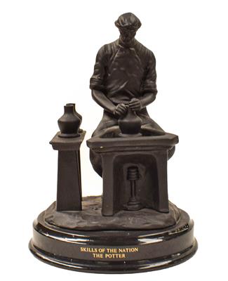 Lot 163 - A Wedgewood black basalt figure, Skills of the Nation, The Potter, in original box with certificate