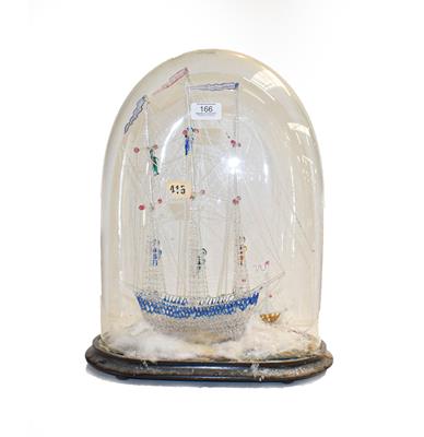 Lot 166 - A Victorian glass ship frigger under a dome, 45cm
