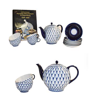 Lot 169 - A Lomonosov porcelain Cobalt Net pattern part tea set (seconds), and a book Lomonosov porcelain...