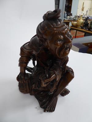 Lot 186 - Five late 19th/early 20th century Chinese hardwood carvings, a fisherman, a nomad, water...