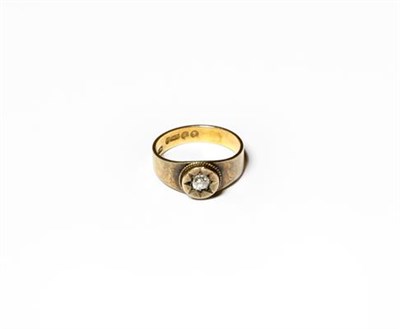 Lot 211 - A 15 carat gold diamond solitaire ring, the old cut diamond within a yellow star setting to a...