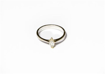 Lot 218 - An 18 carat gold diamond solitaire ring, the marquise cut diamond in a yellow claw setting, to...