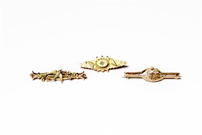 Lot 223 - A 9 carat gold bar brooch, depicting a swallow in flight centrally, length 4.7cm (a.f.); and...