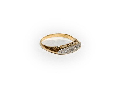 Lot 227 - A diamond five stone ring, the graduated eight-cut diamonds in white claw settings, to a yellow...