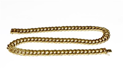 Lot 229 - A curb link necklace, stamped '750', length 48cm