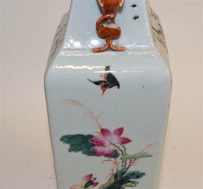 Lot 249 - A Chinese Republic period square baluster vase with twin elephant mask handles and decorated in the