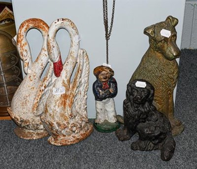 Lot 271 - A pair of Victorian cast iron swan door stops, two other door stops in the form of dogs, and a 19th