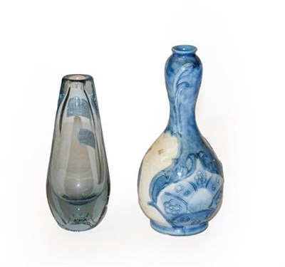 Lot 294 - A Moorcroft Burslem pottery vase, 17cm (a.f.) together with a Kosta glass vase, Sweden, 15cm (2)