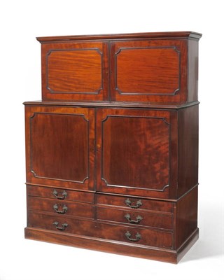 Lot 1536 - A Late George III Mahogany Linen Press, early 19th century, bears part Clumber label, with two...