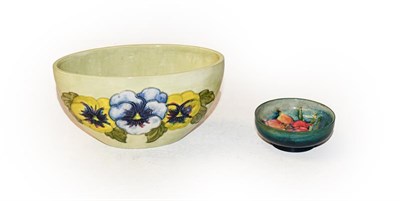 Lot 311 - A Walter Moorcroft Pansy Nouveau vase and a Walter Moorcroft Fresia small bowl (2)