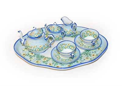 Lot 313 - A Staffordshire doll tea service