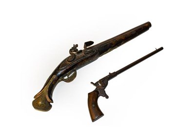 Lot 315 - A Continental flintlock pistol and a rimfire target pistol.