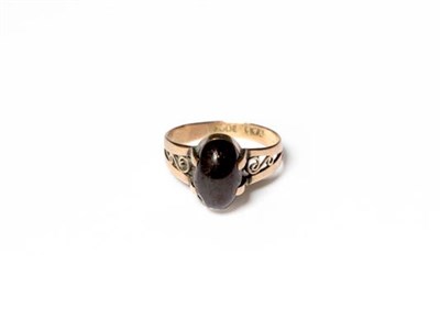 Lot 346 - A garnet ring, stamped '10CT', finger size M