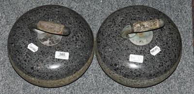 Lot 385 - A pair of curling stones