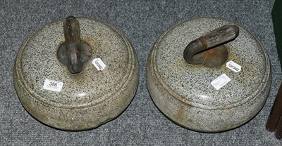 Lot 386 - A pair of curling stones