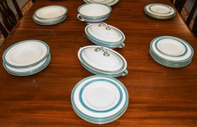 Lot 395 - A Mintons for T Goode & Co Ltd part dinner service, with gilt highlighted turquoise rims...