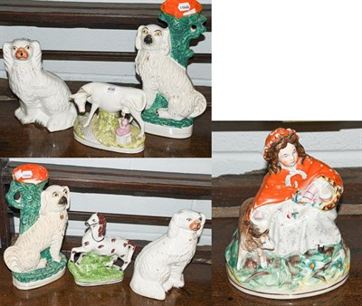 Lot 406 - A group of 19th century Staffordshire figures including two pairs of Spaniels, prancing horse,...