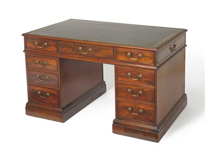 Lot 1548 - A George III Mahogany Double Pedestal Desk, early 19th century, inset green and gilt leather skiver