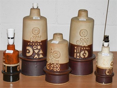 Lot 437 - Five Tremaen Pottery Newlyn Cornwall table lamp bases, three with labels, tallest 39cm high (5)