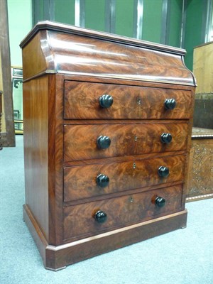 Lot 1555 - A 19th Century Figured Mahogany Washstand, with hinged serpentine front and sliding mechanism...