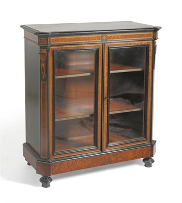 Lot 1556 - A Victorian Amboyna, Ebonised and Marquetry Side Cabinet, mid 19th century, the glazed doors...