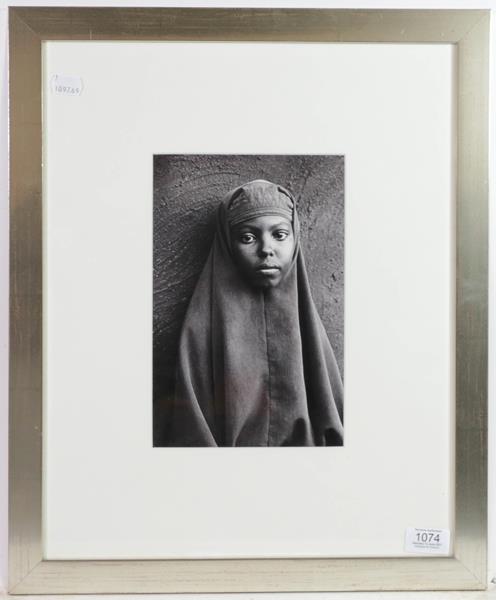 Lot 1074 - Sebastião Salgado (b.1944) Brazilian  Portrait of a young girl from the Somalia series...