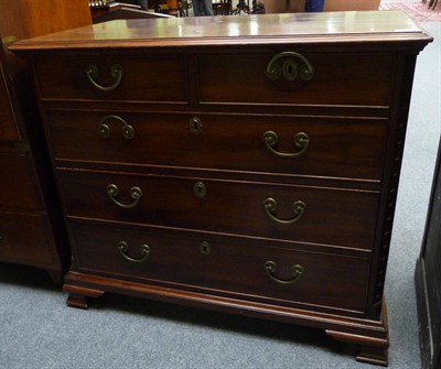 Lot 1565 - A George III Mahogany Straight Front Chest, late 18th century, the moulded top above two short...