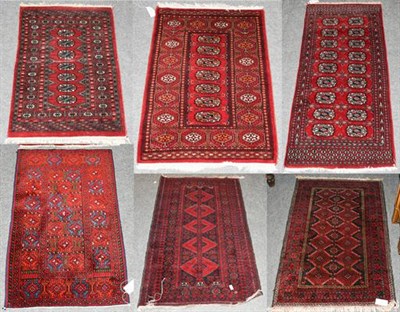 Lot 1219 - A Baluch rug, the field with five diamond medallions enclosed by multiple narrow borders,...