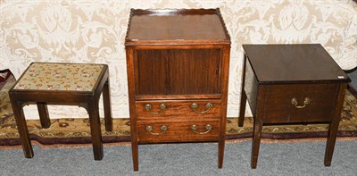 Lot 1224 - A mahogany tambour fronted bedside chest with galleried top, together with a George III...