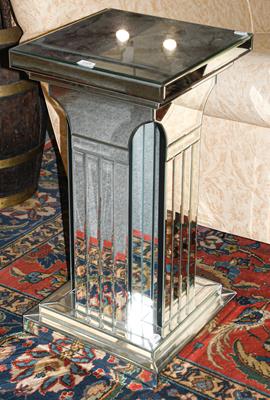 Lot 1229 - A mirrored pedestal, 41cm square by 77cm