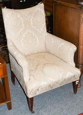 Lot 1259 - A Victorian upholstered armchair, later recovered in floral cream fabric, with overstuffed seat, on