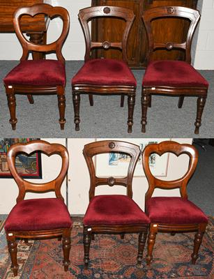 Lot 1265 - A set of three Victorian mahogany balloon back dining chairs, together with a similar set of...