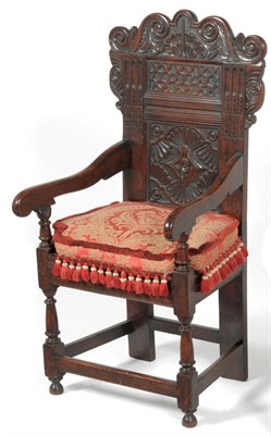 Lot 1578 - A Joined Oak Wainscot Type Chair, 19th century and later, the carved back support and downswept...