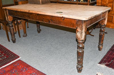 Lot 1296 - A Victorian pine kitchen table, 180cm by 90cm by 77cm