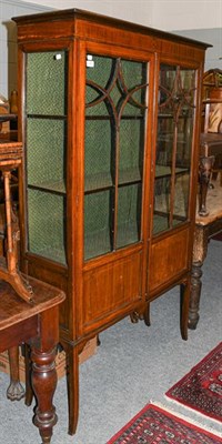 Lot 1300 - An Edwardian inlaid mahogany display cabinet, 105cm by 35cm by 177cm