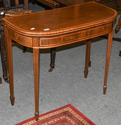 Lot 1319 - A 19th century satinwood cross banded mahogany foldover card table, 87cm by 43cm by 74cm