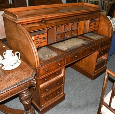Lot 1322 - A Victorian mahogany cylinder desk, stamped T Willson, 68 Great Queen Street, London, mid 19th...