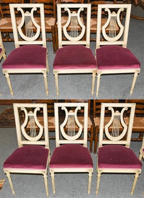 Lot 1325 - A set of six 20th century Empire style Continental white painted lyre back chairs