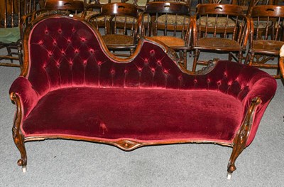 Lot 1331 - A Victorian mahogany framed red buttoned upholstered sofa, 180cm long