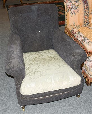 Lot 1332 - A Victorian Howard style armchair, late 19th century, with removable green cover, upholstered...