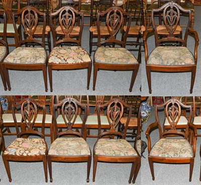 Lot 1334 - A set of nine mahogany Hepplewhite style dining chairs including two carvers