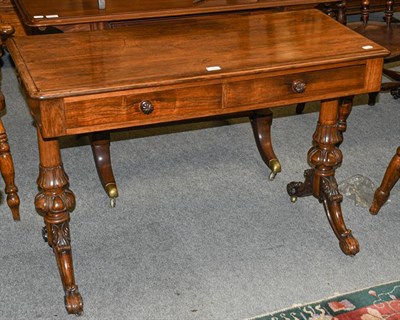 Lot 1342 - A 19th century rosewood library table, 107cm by 50cm by 74cm
