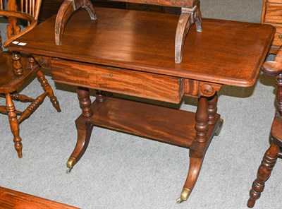 Lot 1346 - A 19th century mahogany writing table, 119cm by 60cm by 73cm