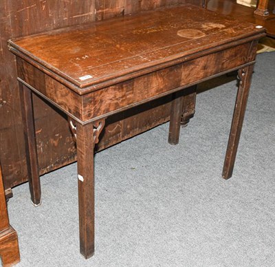 Lot 1362 - A George III mahogany fold-over card table, 91cm by 45cm by 74cm