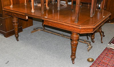 Lot 1366 - A Victorian oak wind-out dining table, with one leaf, 198cm (open) by 125cm by 73cm high