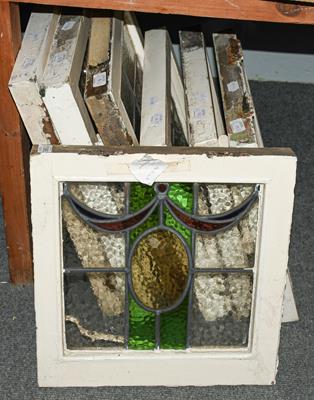 Lot 1380 - A group of seven leaded and coloured glass windows in white painted frames circa 1900/1910, largest