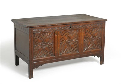 Lot 1587 - A Late 17th Century Joined Oak Chest, the hinged lid enclosing a lidded till above a carved...